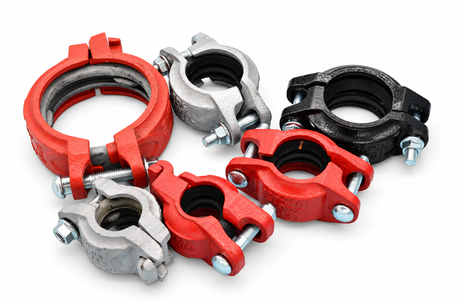 An assortment of red, black and galvanized grooved couplings